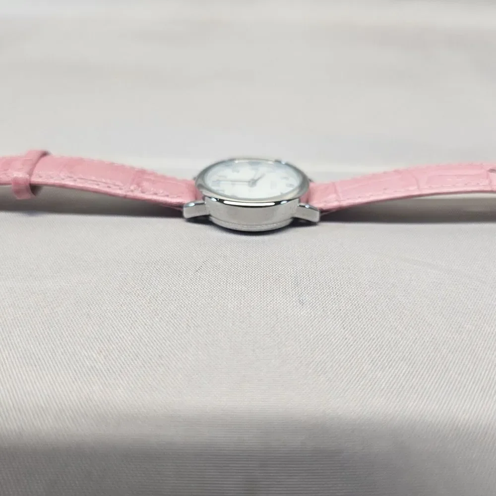 Timex Indiglo women's watch. Classic‎ style face. Pink band Needs Battery